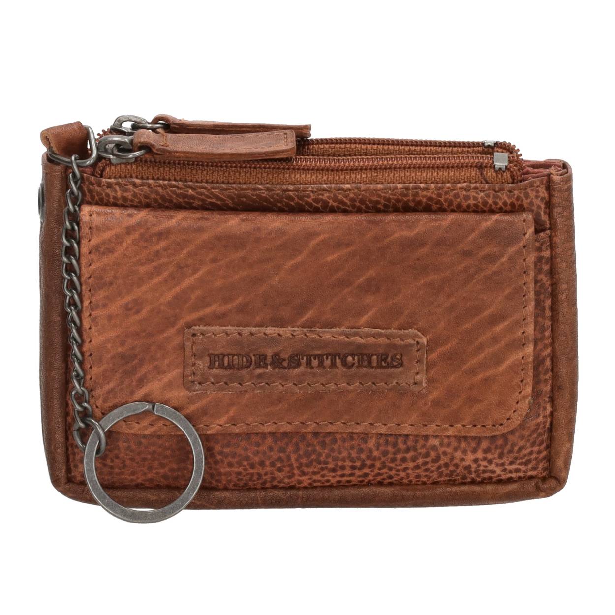 Deze etui is een te leuke accessoire. Hij komt uit de Paint Rock collectie van Hide & Stitches. In de etui kan een sleutel of drie. Je autosleutel, huissleutel of andere sleutel veilig opgeborgen in een mooi leren etuitje. Je kunt hem meenemen in je tas, jas of zak. Ben jij al verkocht?

De eigenschappen van de sleuteletui zijn:

Ritssluiting 
Overslag
Sleutelkoord