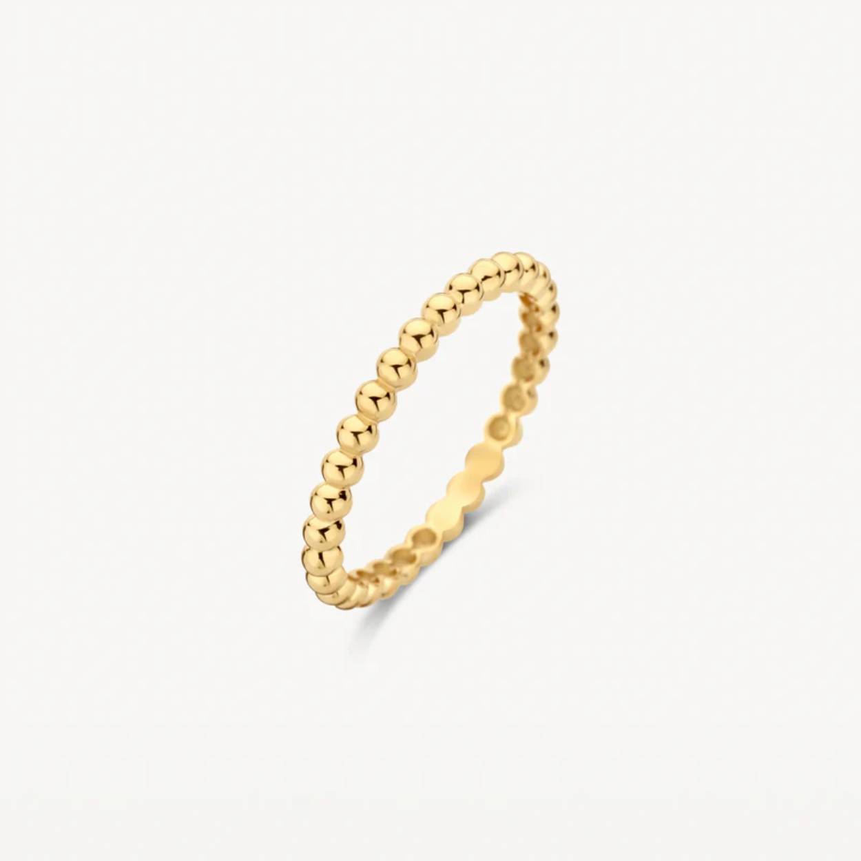 Een deel van de band van deze 14k geelgouden ring heeft een speels bolletjesmotief. De band is 2 mm breed. Mooi te mixen en matchen met andere ringen uit onze collectie.
