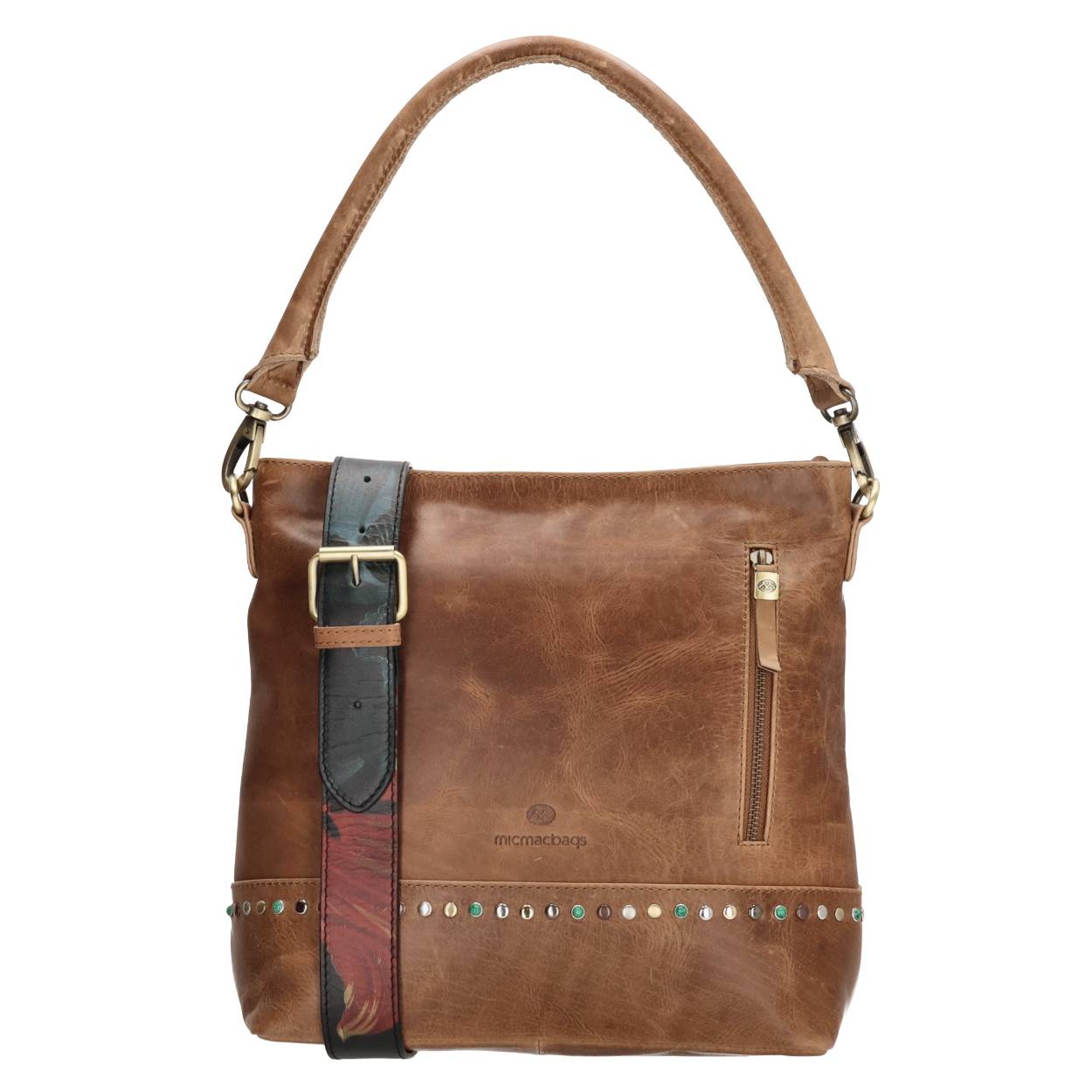 Twee stijlen in één met deze shopper uit de Masterpiece collectie van Micmacbags! Je kunt de tas namelijk aan het enkele, afneembare handvat dragen óf over de schouder aan de brede, afneembare en verstelbare schouderband met toffe print! In het hoofdvak van de tas, dat sluit door middel van een ritssluiting, bevinden zich een insteekvak en ritsvak. Zo zijn al je (kleine) spullen veilig. Daarnaast heeft de tas op de voorzijde een extra vakje met ritssluiting. Voor welke look ga jij? 

De Masterpiece collectie van Micmacbags is geïnspireerd op het kunstwerk 'Bloemen en een horloge' van de stillevenschilder Abraham Mignon. Met de Masterpiece collectie wordt een stukje kunst aan jou doorgegeven! De tassen en portemonnees zijn gemaakt van onze cow pull up, een sterke leersoort die alleen maar mooier wordt door het te gebruiken.

De eigenschappen van deze shopper zijn: 

Voorvak met ritssluiting
Hoofdvak met ritssluiting
Insteekvak
Ritsvak 
Brede, afneembare en verstelbare schouderband met print
Enkel, afneembaar handvat in de kleur van de tas 
