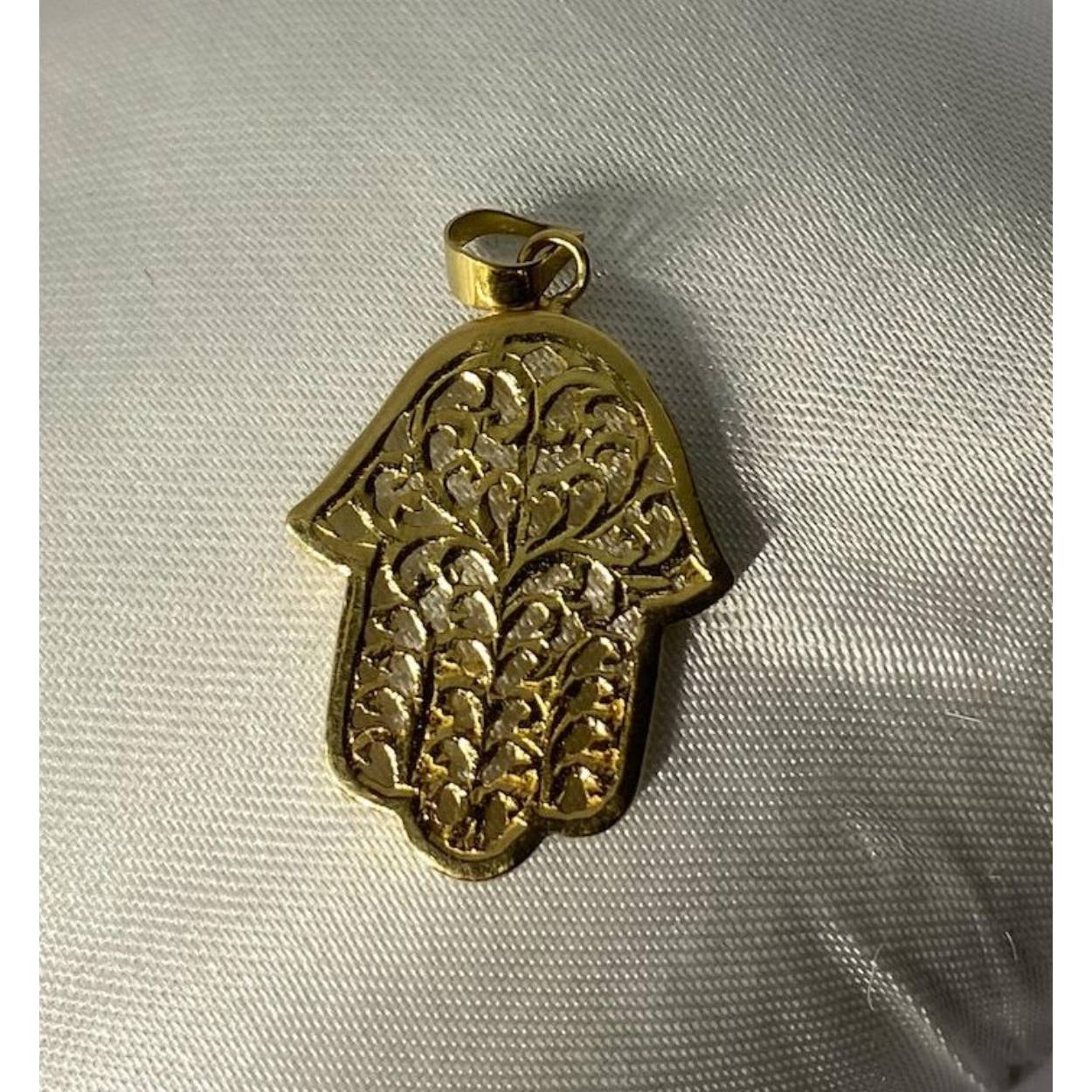 18 karaat geel gouden fatima hand hanger.
Leuk te combineren met een collier uit onze brede assortiment!