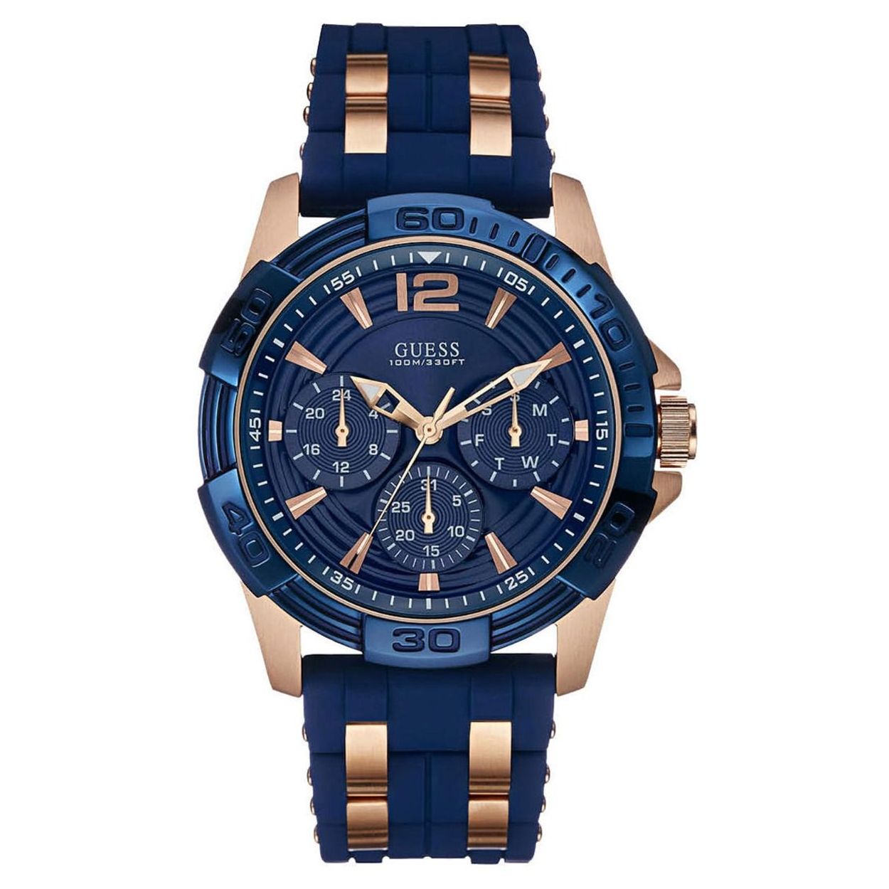 Dit blauwe GUESS Oasis herenhorloge is stoer en robuust met zijn chronolook en siliconenband met gespsluiting. De rosegoudkleurige tijdsaanduiding en details van roestvrij staal in de band zorgen voor een opvallend eigentijds design. De diameter van de kast is 43,5 mm en het horloge is tot 5 ATM waterdicht. Model: W0366G4