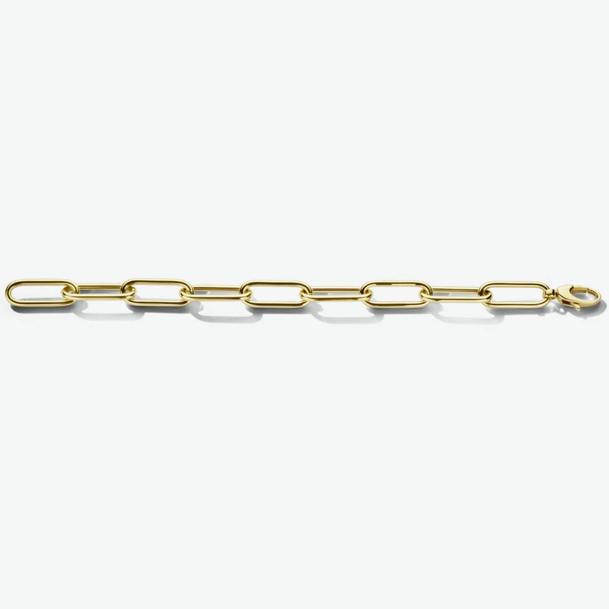 14k Geelgouden paperclip armband met een ronde buis. De armband heeft een draaglengte van 20 cm.
