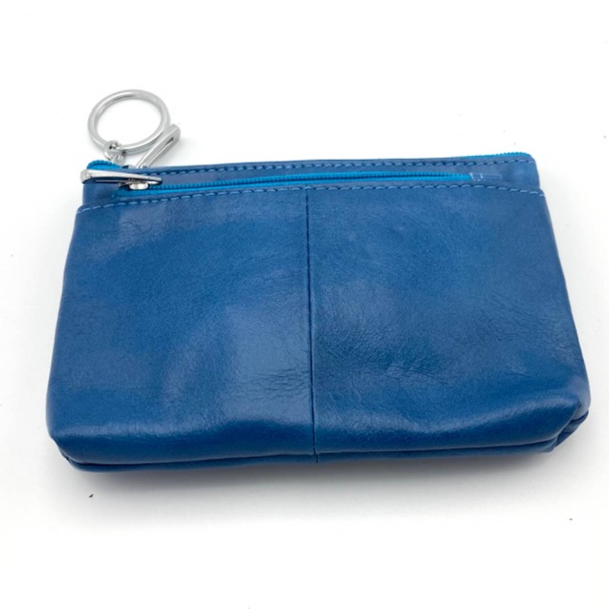 Handig sleutel etui met ruimte voor geld, pasjes en sleutels.

Afmetingen
Hoogte 9cm x breed 13cm x diep 0.5cm