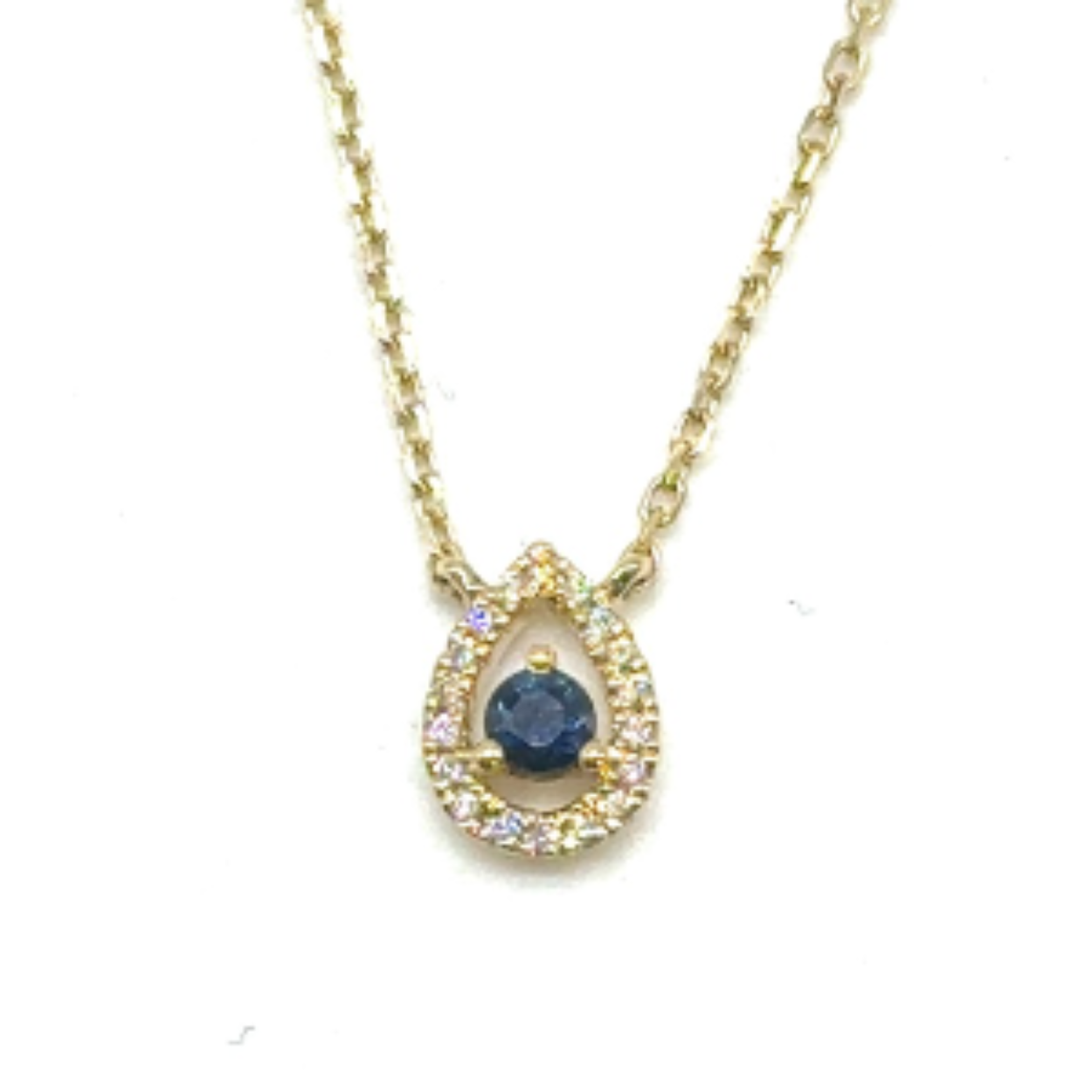 14k gouden collier met een saffier steen van 0.05 carat. wit diamant van 0.12 carat. 