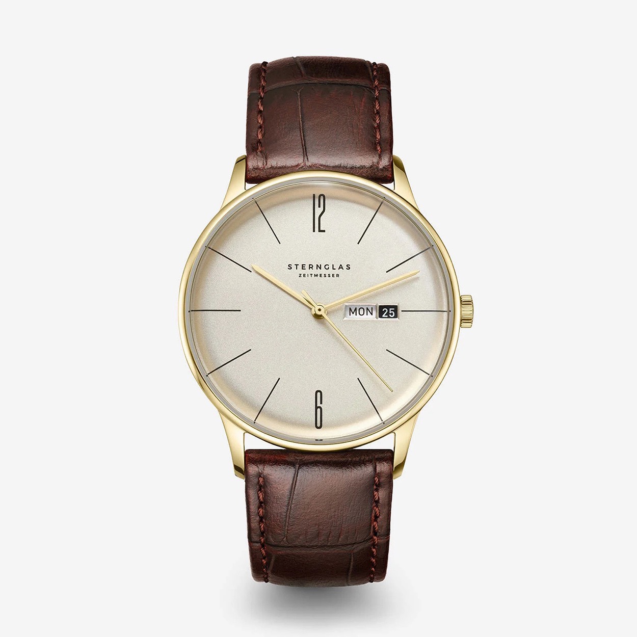  STERNGLAS Naos S01-BE14-HE01

Analoog
- Quartz uurwerk
- Serie: Berlin

- Edelstalen kast
- Kleur kast: goud
- Creme wijzerplaat
- Uren, minuten, secondes, dag, datum
- Diameter kast: ca. 38 mm
- Hoogte kast: ca. 8 mm (excl. glas)
- Ontspiegeld saffierglas
- Waterdichtheid: 5 ATM

- Leren band
- Kleur band: bruin
- Gespsluiting

2 jaar fabrieksgarantie 
