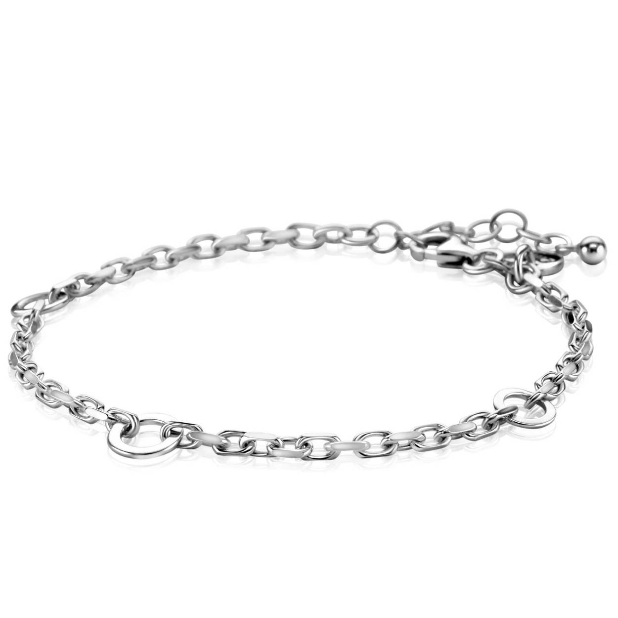 ZINZI zilveren schakelarmband met ovale schakels en drie open ronde schakels van 7mm breed. Met herkenbaar Zinzi hartje bij de sluiting. De lengte is te variëren tussen 17,5 en 20 cm. Vervaardigd van eerste gehalte zilver (925) en met extra rodiumlaag voor een langdurige glans.