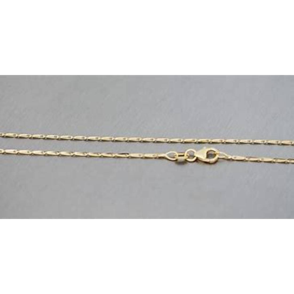 14k geelgouden schakelketting haverkorrel met een dikte van 0.9mm en 42 cm lang