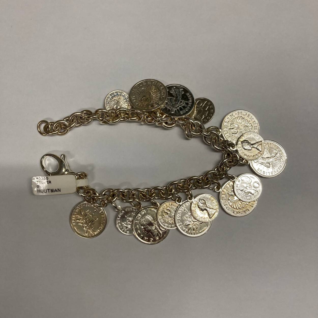 Zilveren armband met munt hangers fantasie