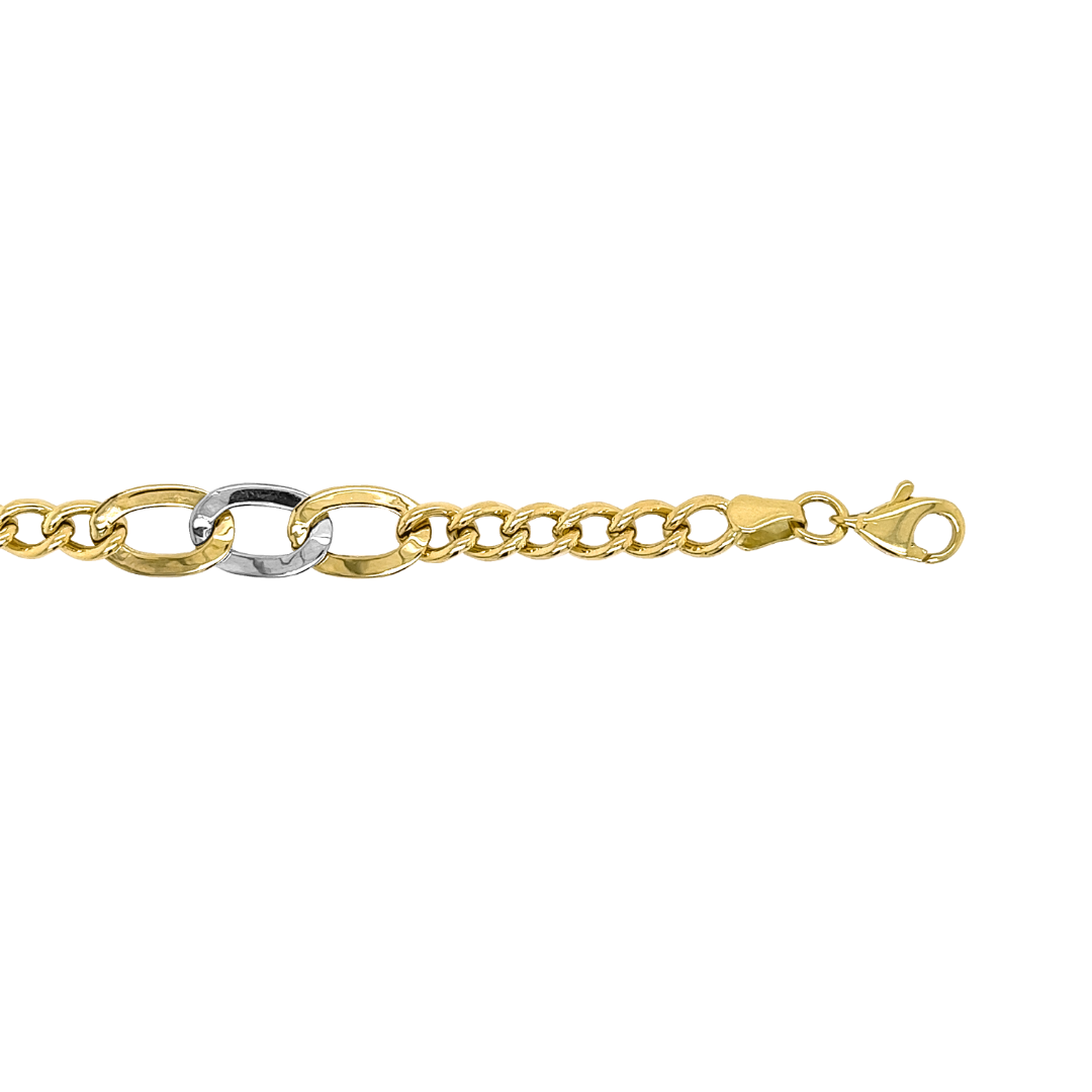 Deze bicolor gouden armband is erg bijzonder en uniek. De 'bekende' gouden schakel wordt driemaal onderbroken door drie grotere schakels waarbij de middelste schakel van witgoud gemaakt is.