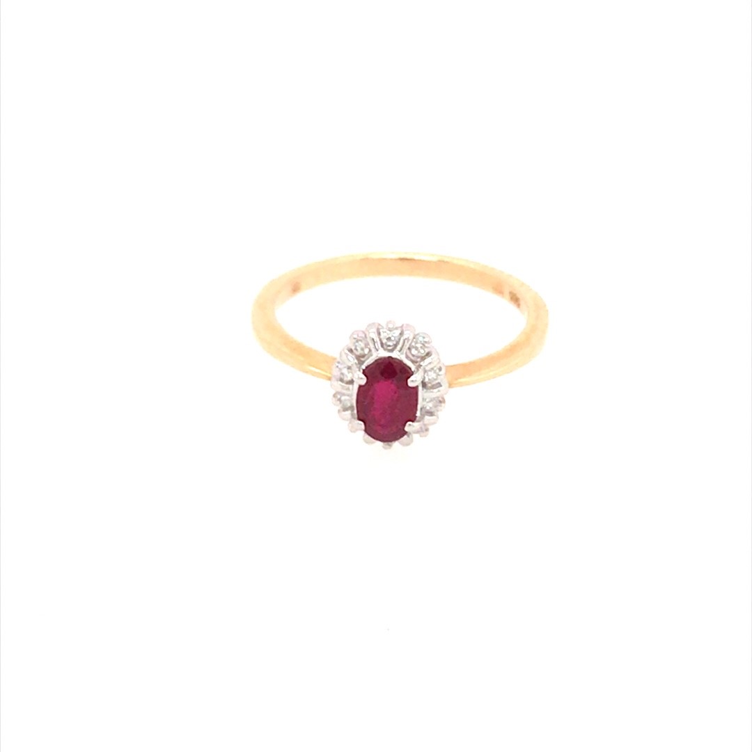IDN 14krt geelgouden ring met robijn en diamant in een witgouden zetting