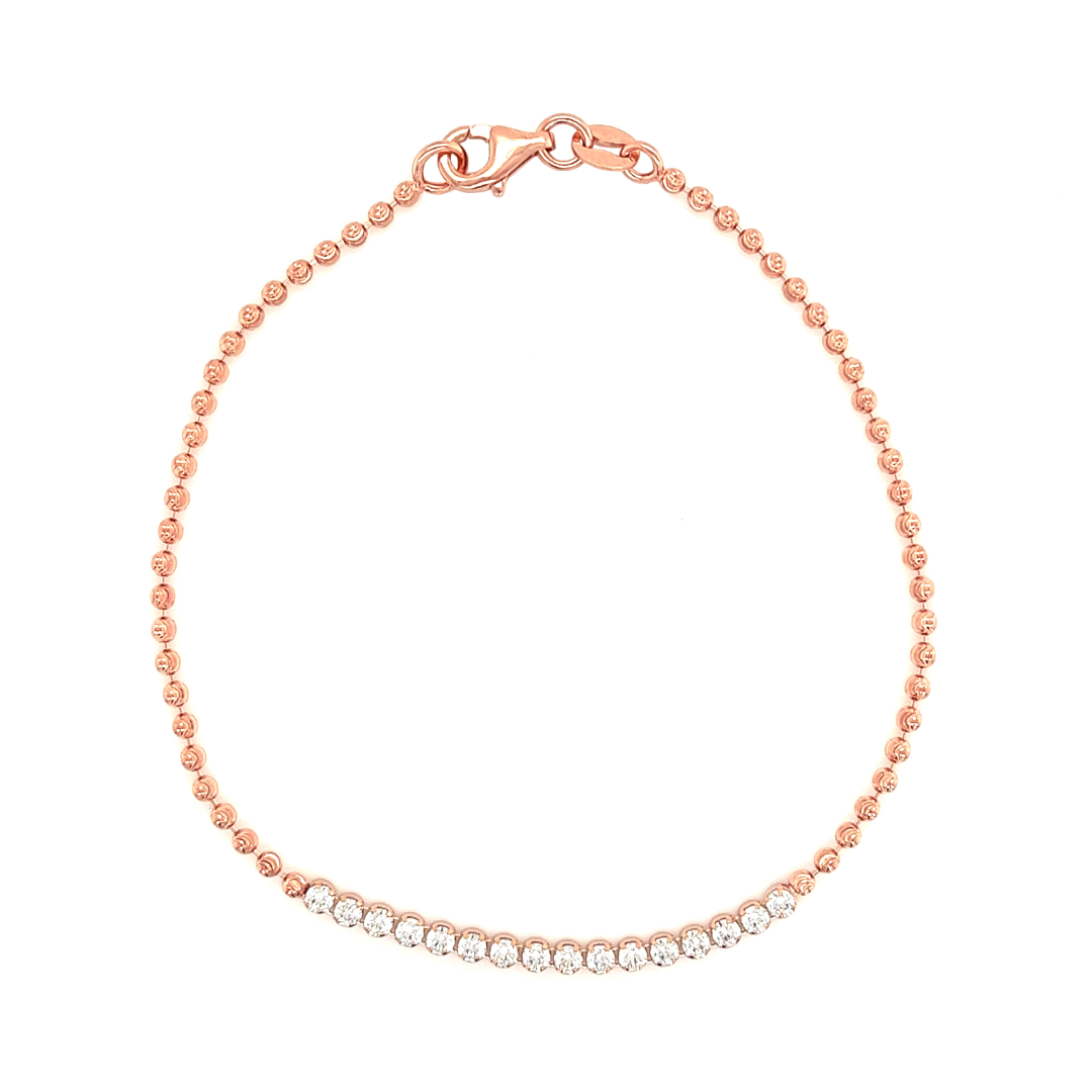 Deze rosé zilveren armband is bolletjes geschakeld met aan de bovenzijde een rij met briljant geslepen zirkonia stenen. Lengte van de armband is 19cm.