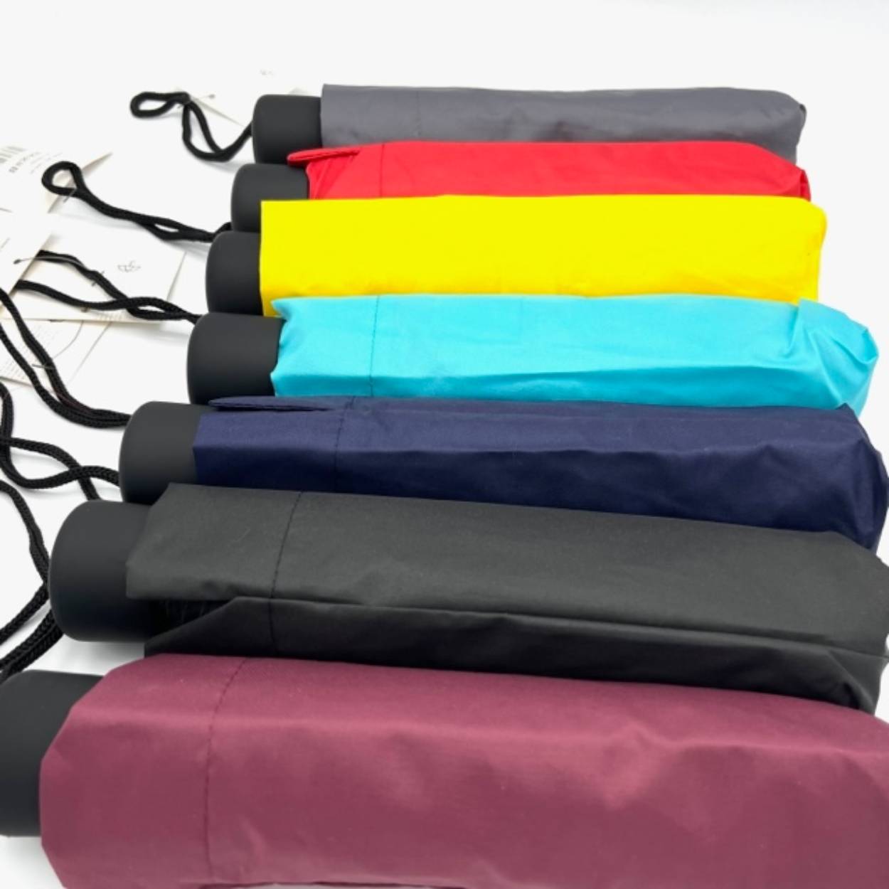 wij hebben uni paraplu's in verschillende kleuren.