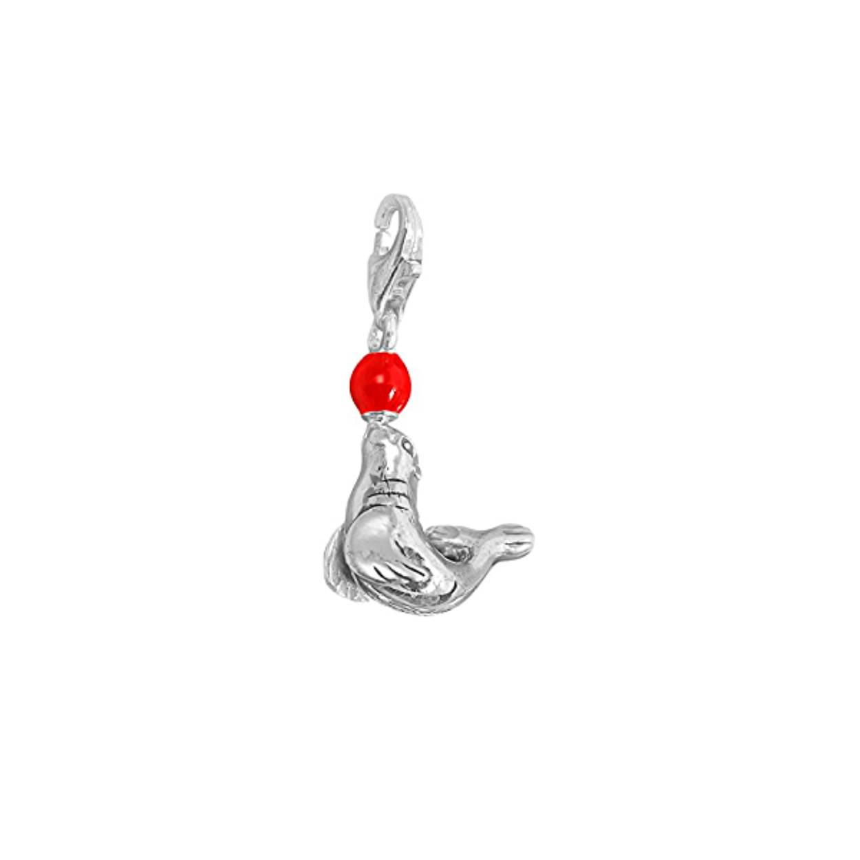 Zilvere bedel zeehond met rode bal op zijn neus. Wie is er bij een zee aquarium geweest en wil een leuke herinnering daaraan? Of is er gewoon dol op?