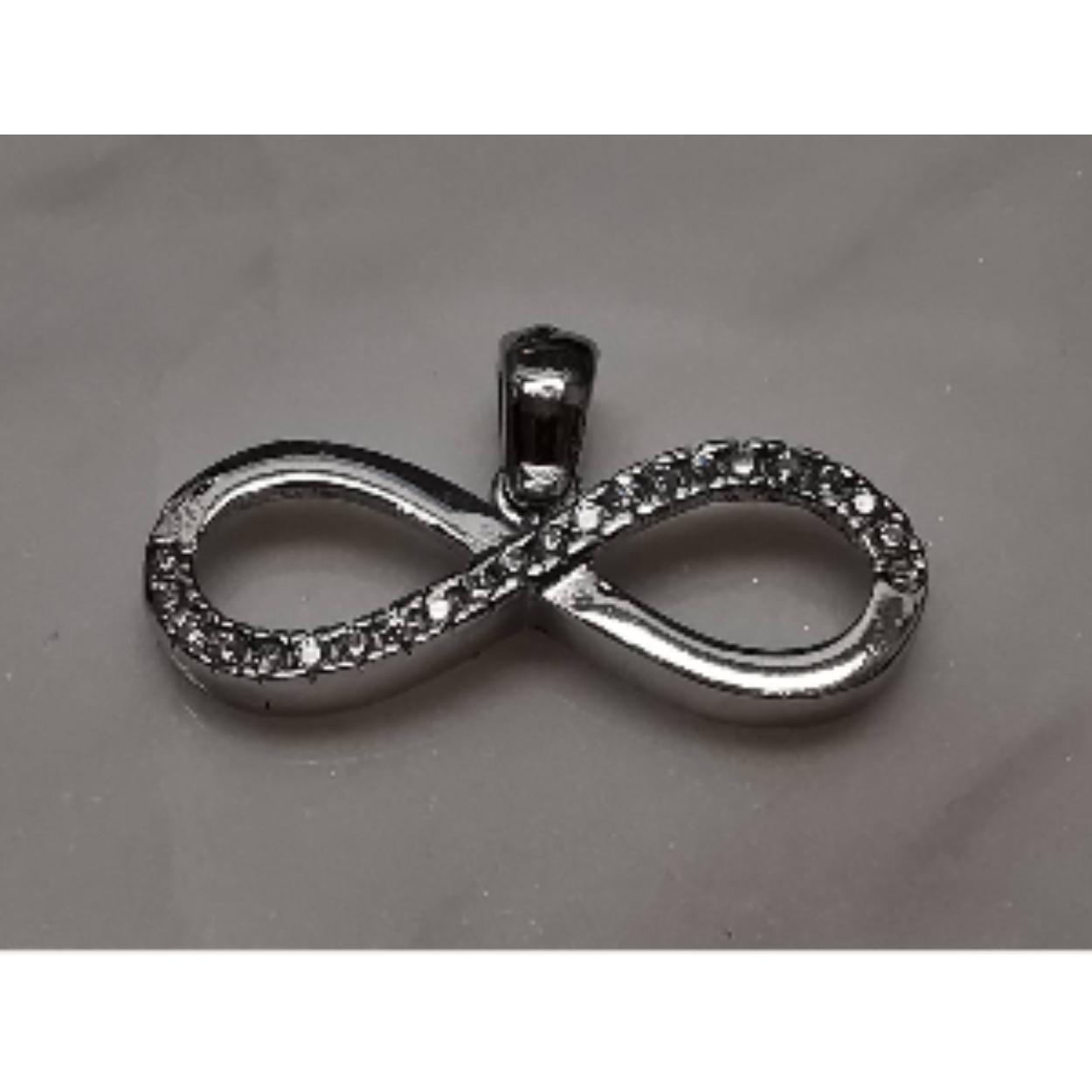 Zilveren hanger met infinity teken bezet met zirkonia 