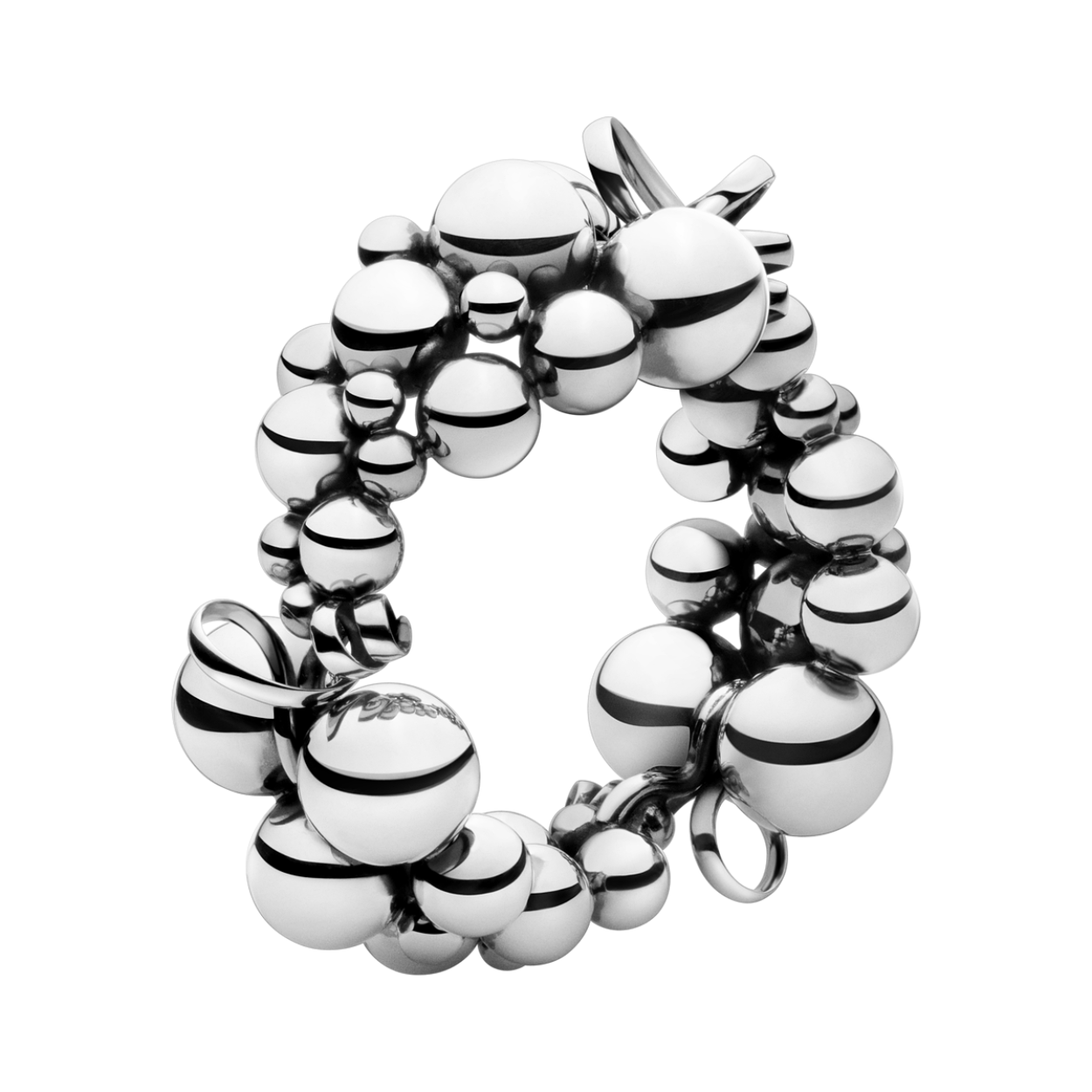 Bold and sculptural, this striking bracelet comprises of large clusters of stylised grapes that wrap around the wrist to dramatic effect. A beautiful example of creativity and Scandinavian style, the shapes themselves derive from a grape motif found on early Art Nouveau Georg Jensen silverware but abstracted and reworked into a totally contemporary interpretation. The bracelet would suit any woman with her own individual sense of style.