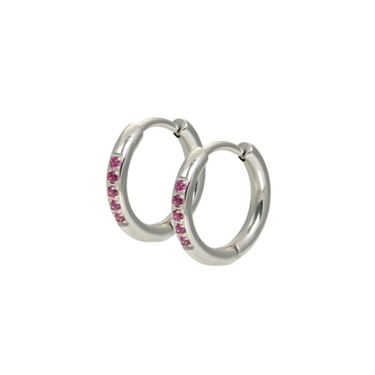 De iXXXi Hoops Fuchsia zijn gemaakt van stainless steel. De oorbellen zijn ringetjes van 14mm groot die je gemakkelijk kunt openen en in je oor kunt steken. Aan de voorkant van de ringetjes zitten vijf fuchsiakleurige zirconias bevestigd. De iXXXi Hoops Fuchsia zijn een echte must-have voor jouw earparty! Je kunt namelijk meerdere oorbellen naast elkaar dragen. Heb je meerdere gaatjes in je oren? Draag dan de iXXXi Hoops Fuchsia in je eerste gaatje en combineer met ons grote assortiment iXXXi earstuds in de kleur zilver. Wil je de Hoops Fuchsia nog specialer maken? Bevestig dan de Hoop Charm Lucia Fuchsia aan de oorbel.