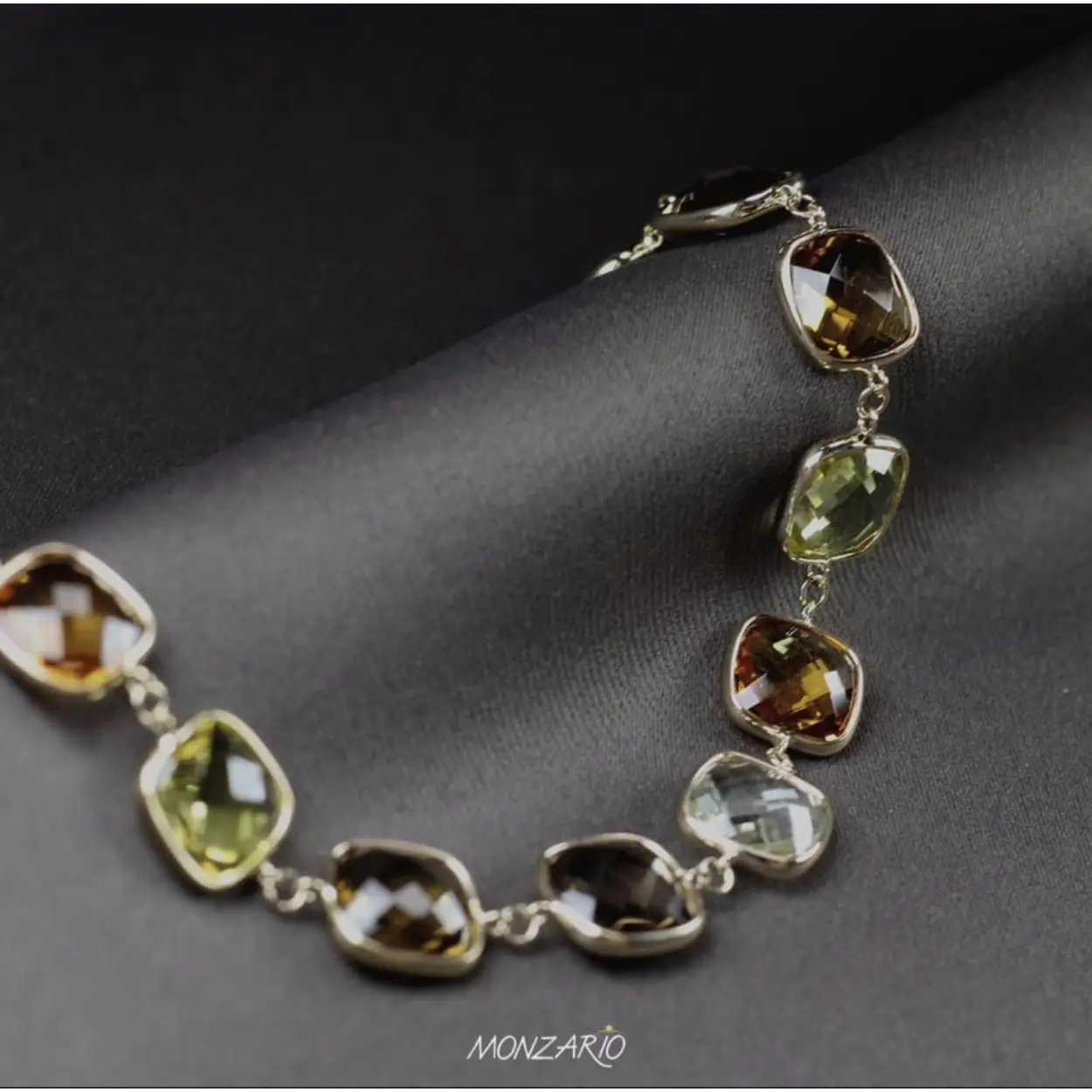 gouden Monzario armband, citrien/geel kwarts/rookkwarts/groen amethist 19cm