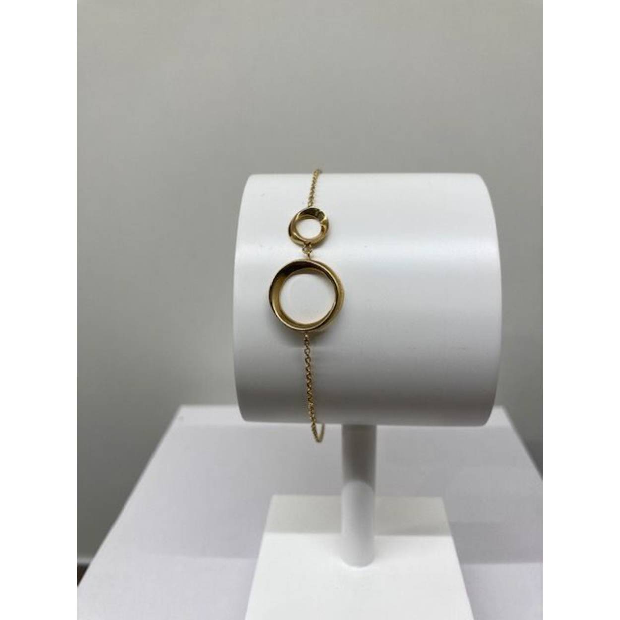 Gouden fantasie schakel armband. 

16 + 3 cm