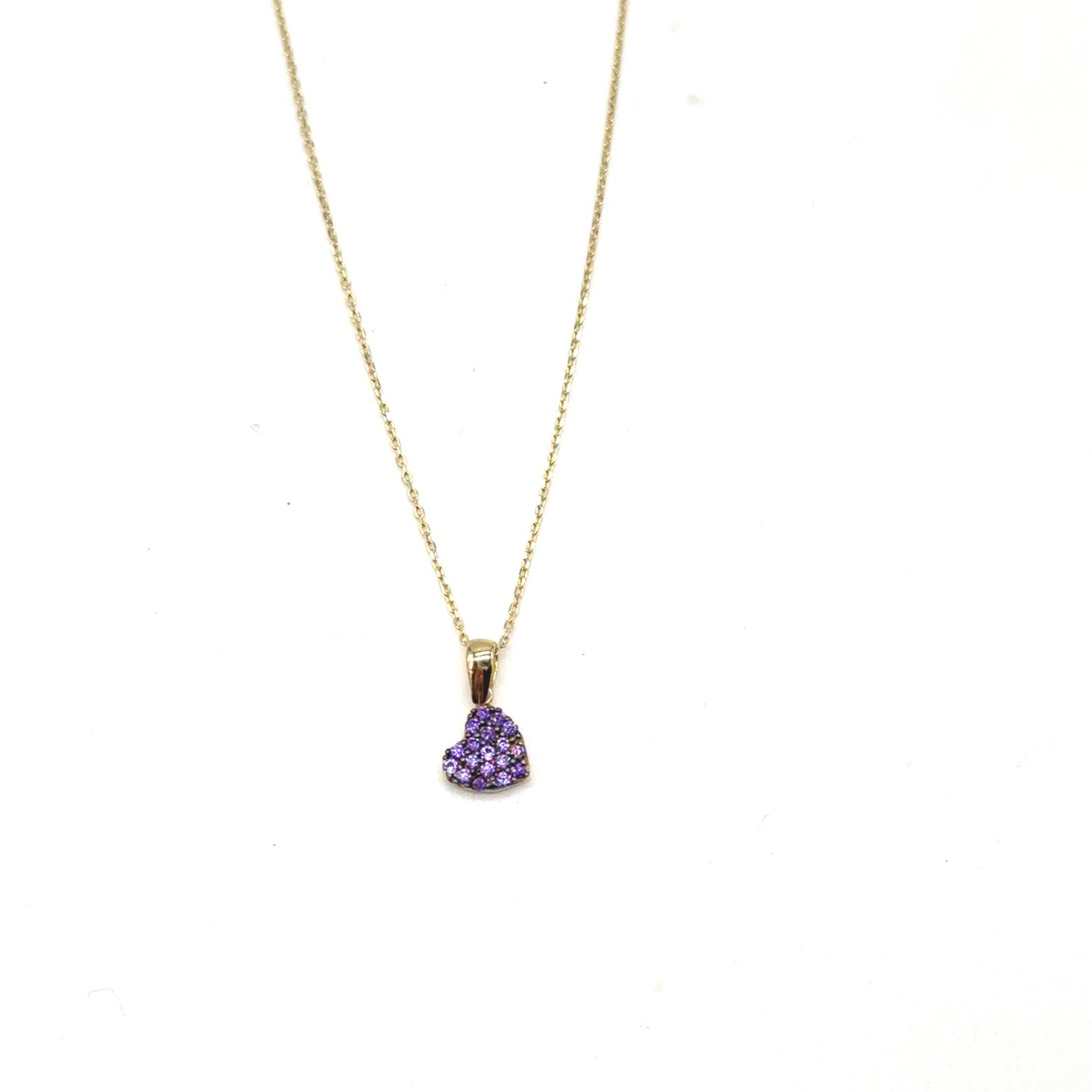 14k gouden ketting met hanger. hartje is gezet met paarse zirkonia stenen. 