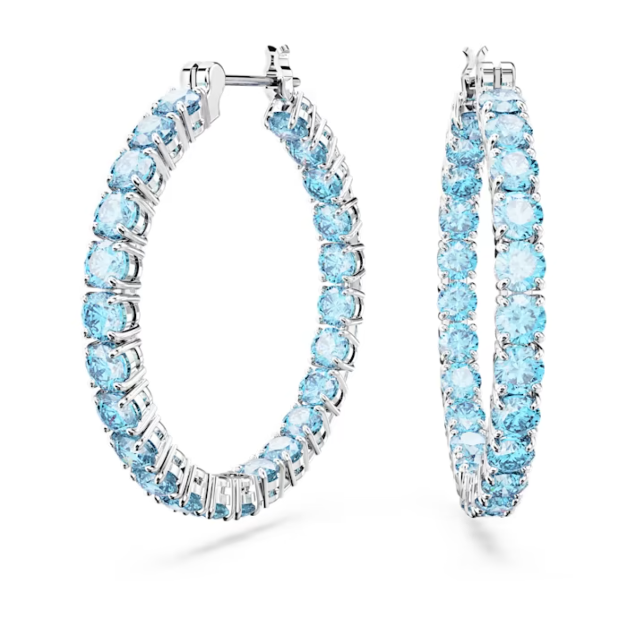 Deze ingetogen maar kleurrijke Matrix-oorringen mogen niet ontbreken in uw sieradencollectie. De perfecte cirkel van ronde blauwe stenen is afgewerkt met een rhodium toplaag voor een verfijnde combinatie van koele tinten. Combineer deze oorbellen met andere sieraden uit de Matrix-lijn voor een harmonieuze look.
