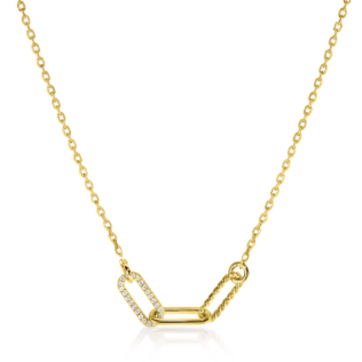 ZINZI gold plated zilveren ketting 45cm met drie trendy paperclip-schakels: met gladde buis, gedraaide buis of bezet met witte zirconia's. De lengte van de ketting is te variëren tussen 42 en 45cm door het handige verlengkettinkje. Bij sluiting herkenbaar ZINZI, door het zilveren Zinzi hartje. Vervaardigd van eerste gehalte zilver (925) en voorzien van een extra 14K geel vergulding.