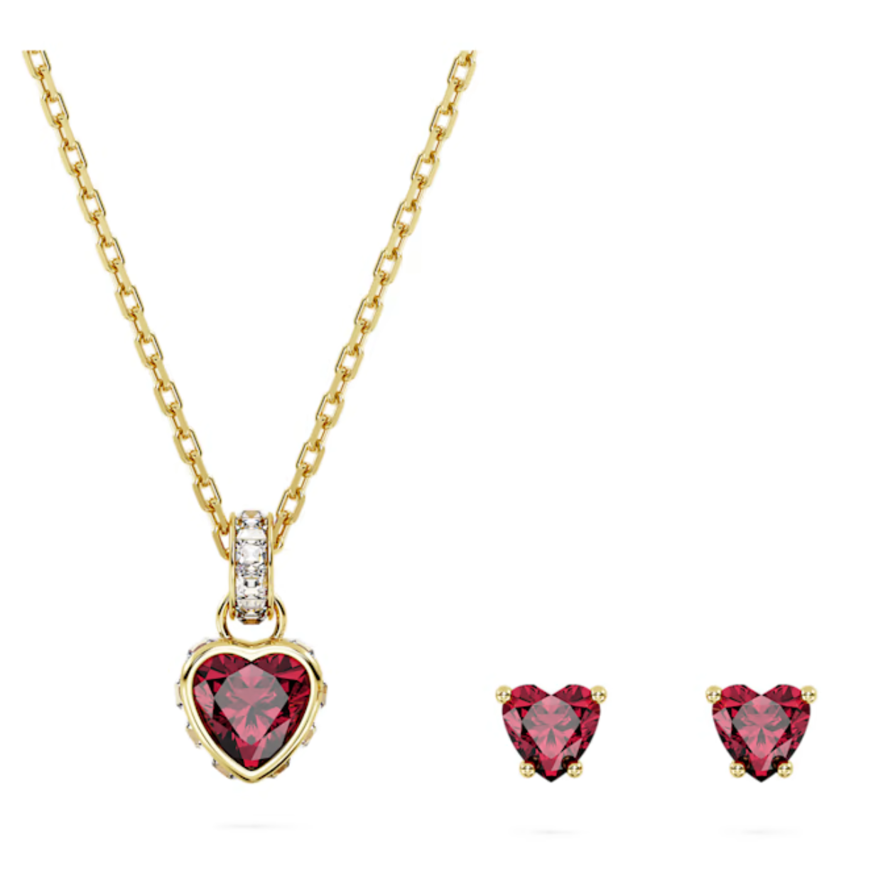 Laat uw hart sneller kloppen met deze romantische sieradenset uit de Stilla-lijn. De sieraden met een goudkleurige toplaag bestaan uit een paar hartvormige rode oorknopjes, en een fascinerende hanger met een hartvormige steen in het midden en heldere vierkante kristallen langs de randen en het ringetje. Een subtiele en toch krachtige manier om uw stijl een elegant en kleurrijk accent te geven.