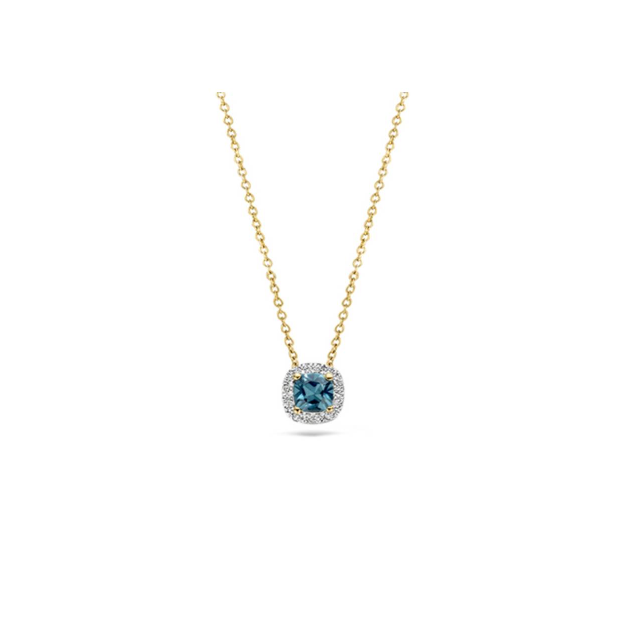 Dit collier valt op door de stijlvolle combinatie van 14k geel- en witgoud, diamant en blauwe topaas. Het collier is 42 cm lang en de diamantjes hebben een totaalgewicht van 0,05 karaat. Het collier matcht prachtig met andere sieraden met blauwe topaas uit onze collectie. 