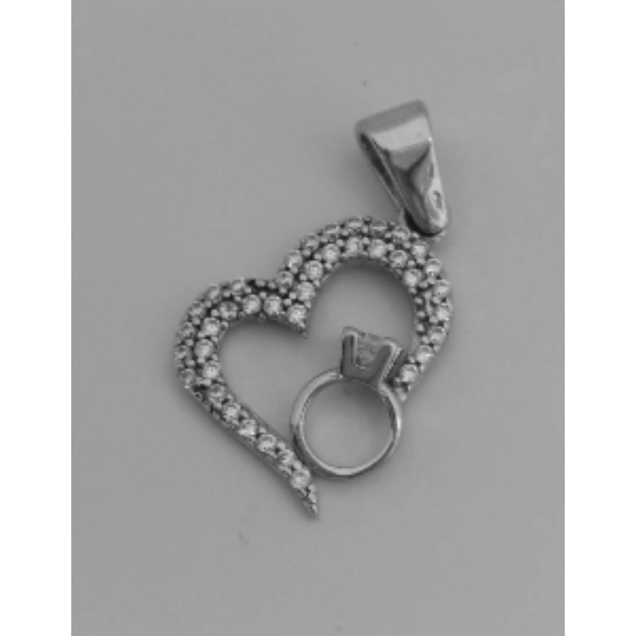 Zilveren hanger hart met een kleine ring solitair zirkonia