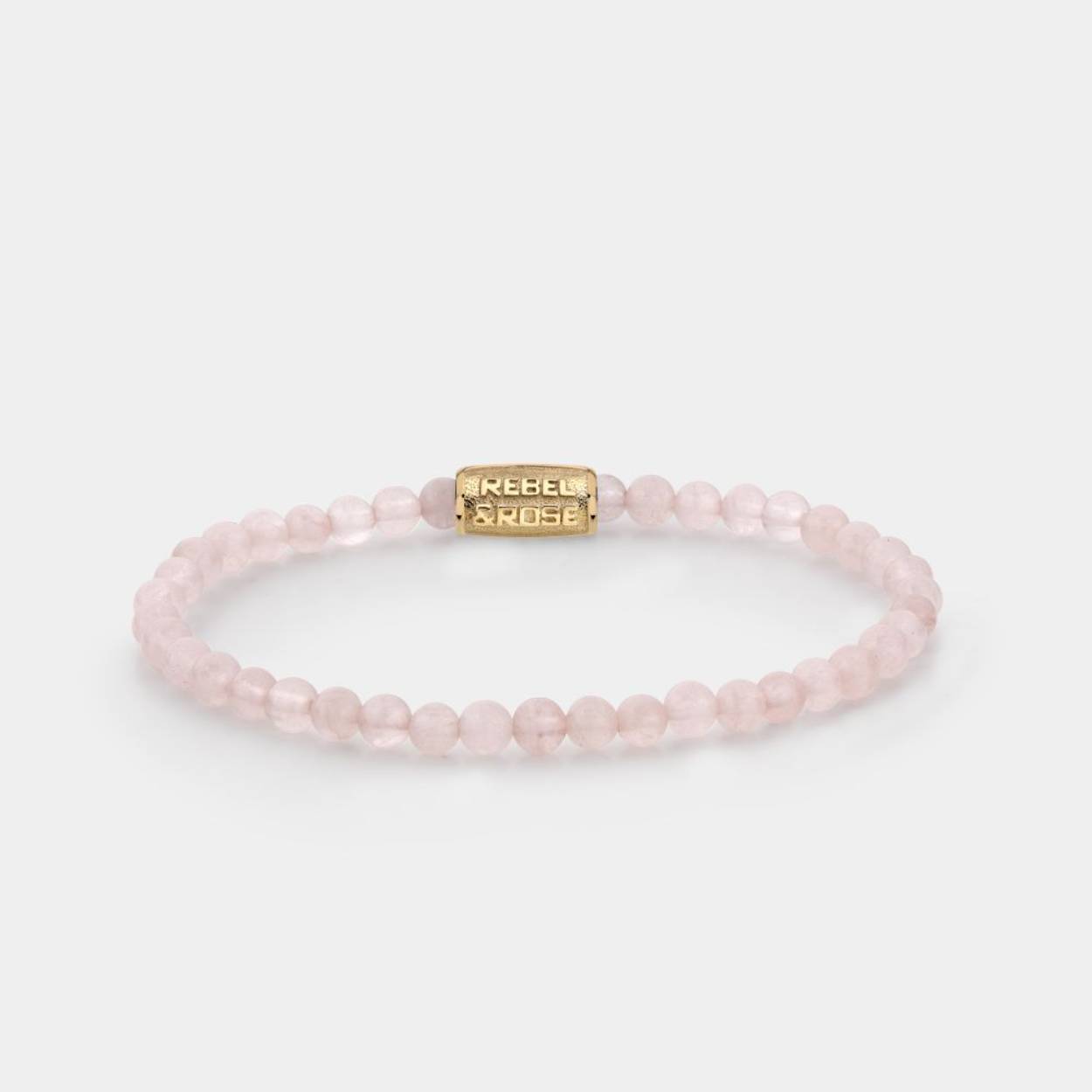Edelstenen bead armband, handgemaakt van 4mm Rozenkwarts stenen met een 18 karaat goud ion-plated sluiting. Het Rebel & Rose sieraad is makkelijk te combineren met onze andere kralenarmbanden.
Maat XS: 15 cm
Referentie: RR-40103-G-XS
