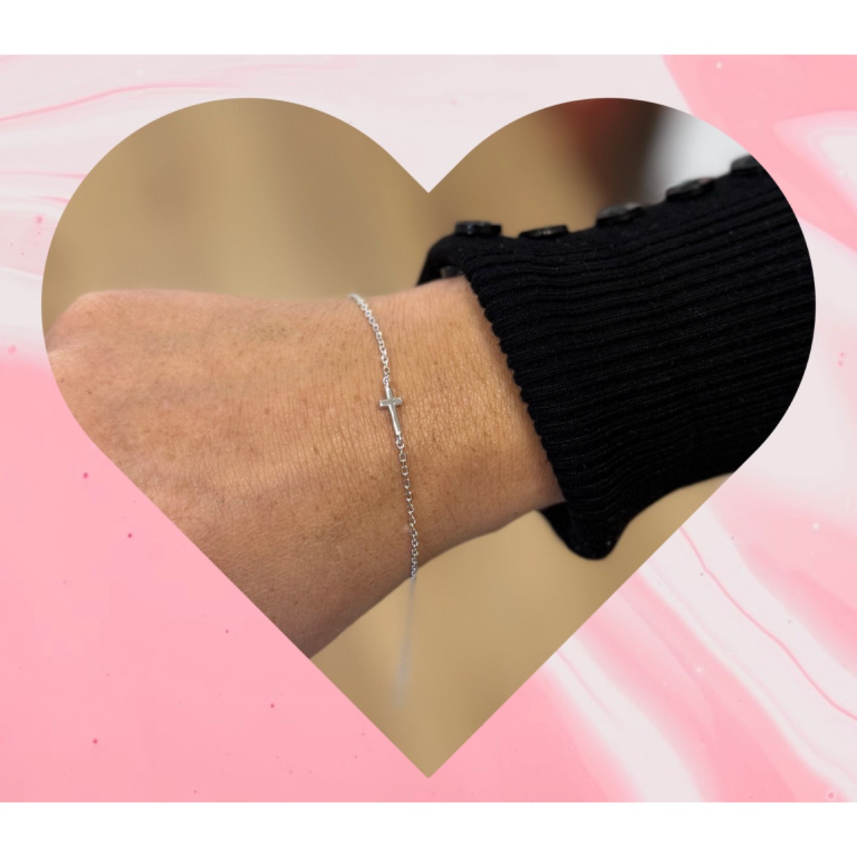 Zilver Imenso armbandje met een kruisje.
Gerhodineerd.