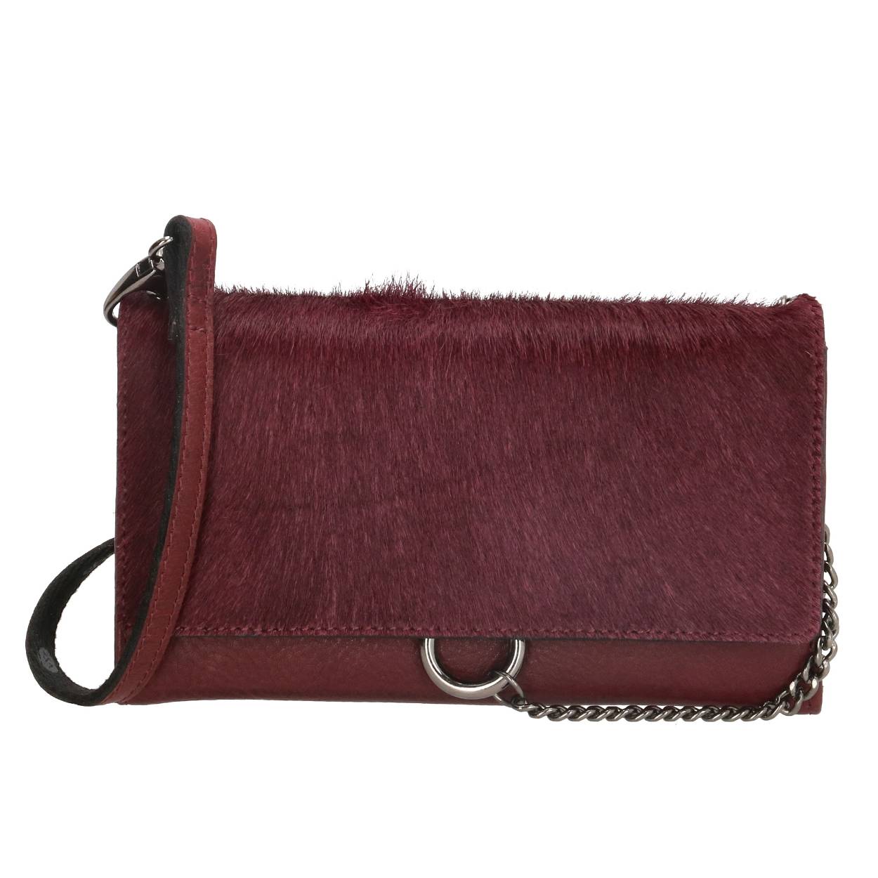 Een portemonnee en schoudertasje in één, hoe handig! Deze schoudertas uit de Mendoza collectie van Micmacbags neem je super makkelijk mee als je even weg moet voor wat boodschappen, want je telefoon en pasjes passen erin! Het tasje sluit door middel van een drukknoop. In het hoofdvak bevinden zich 12 creditcardvakken, twee insteekvak voor briefgeld, een klein insteekvakje en een ID-venster. Ook is er in het midden nog ruimte voor je telefoon. Op de achterzijde bevindt zich nog een ritsvakje voor bijvoorbeeld wat muntgeld. Je kunt dus al je belangrijke spullen in één keer geordend meenemen in dit tasje! Je draagt ‘m makkelijk aan de verstelbare en afneembare schouderband. Je kunt dit tasje dus ook los als portemonnee gebruiken! Ga jij met deze toffe tas op pad?

