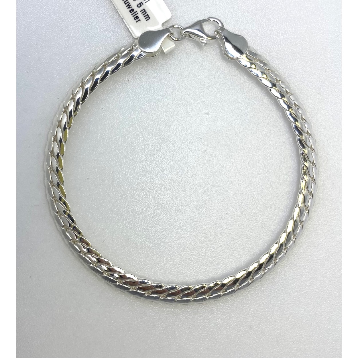 Zilver armband bol gourmet 19 cm.
Breedte: 5 mm
Met karabijnsluiting
