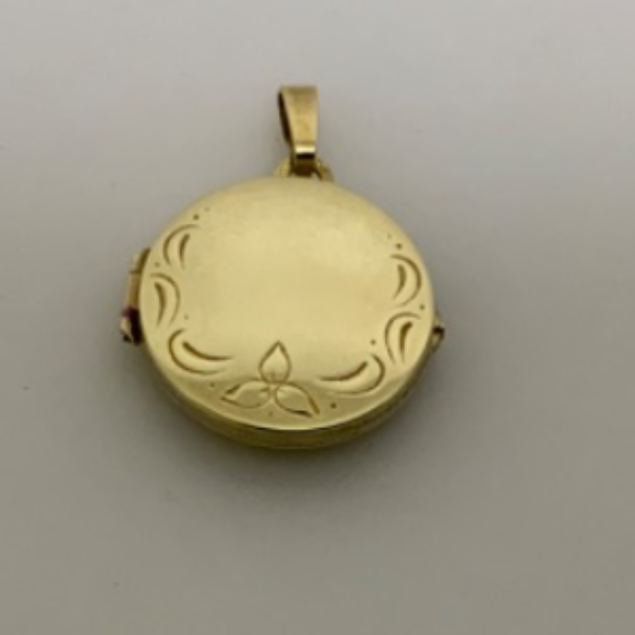 Gouden medaillon rond bewerkt 17 mm
