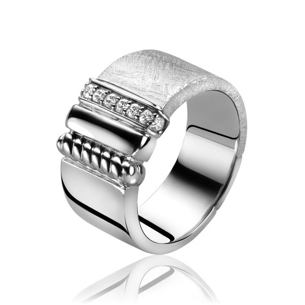 ZINZI zilveren ring exclusief ontworpen door Mart Visser. Deze unieke ring is 11mm breed en heeft een fraaie matte & gladde bewerking op beide schenen van de ring. De bovenkant heeft een speelse combinatie van 3 rijen, namelijk witte zirconia's, bolletjes en gladde plaat. De ring draagt herkenbaar de signatuur van Mart Visser. Vervaardigd van eerste gehalte zilver (925) en met extra rodiumlaag voor een langdurige glans.