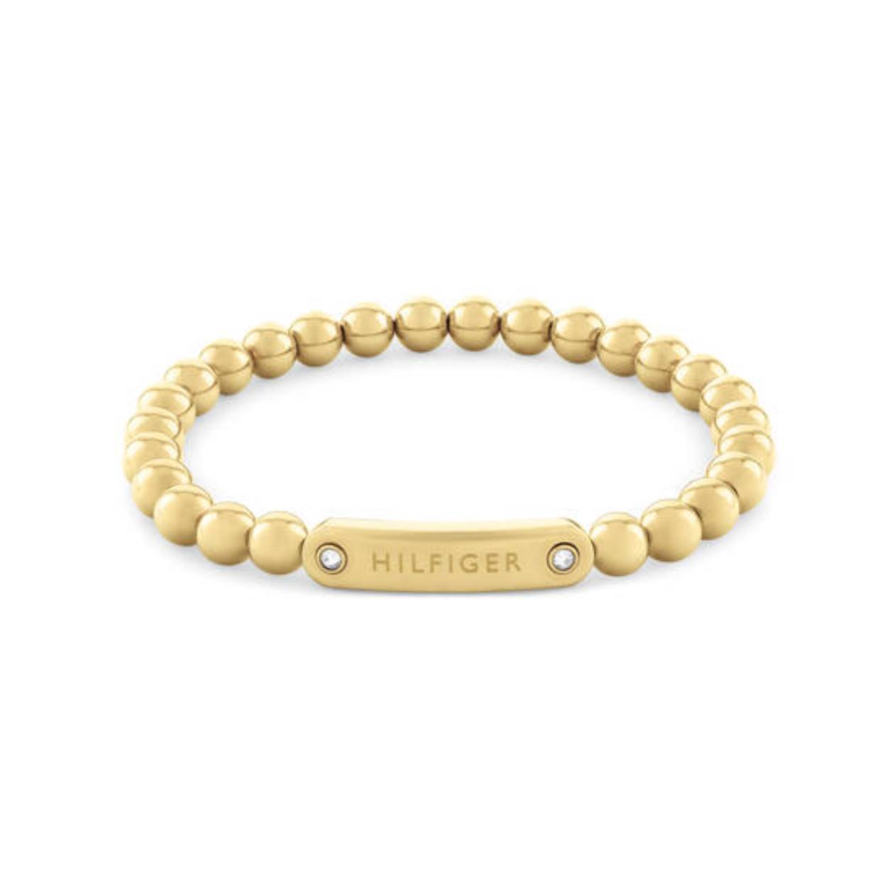 Tommy Hilfiger Jewels TJ2780935 Armband Dames Staal 16,5cm
Deze armband van Tommy Hilfiger uit de jewelry serie METAL BEADS met nr: TJ2780935 is een opvallend model. De dames armband is van elastiek met daarop goudkleurige stalen balletjes van 6mm geregen. Tussen de balletjes zit een goudkleurige plaat met daarop het Tommy logo gegraveerd en aan de uiteinden een kristal gezet. De armband is geschikt voor een pols van ong. 16,5cm. Door het elastiek is hij rekbaar. Ook leuk te combineren met andere armbanden en sieraden van Tommy Hilfiger.

Het merk:
Tommy Hilfiger is wereldwijd één van de grootste designer lifestyle merken en is internationaal bekend om haar classic American cool stijl. De sieraden zijn voor dames en heren met een eigen stijl, die niet bang zijn om dit aan de wereld te laten zien.

Specificaties:
- Kralen armband goudkleurig
- Materiaal: Staal
- Rekbare lengte 16,5cm
- Dames sieraad