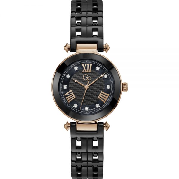Gc – Guess Collection rond zwart met rose stalen dames horloge met blauw/grijs parelmoer en rose accenten op de wijzerplaat en zirconia’s met een zwarte keramische rand en schakelband.