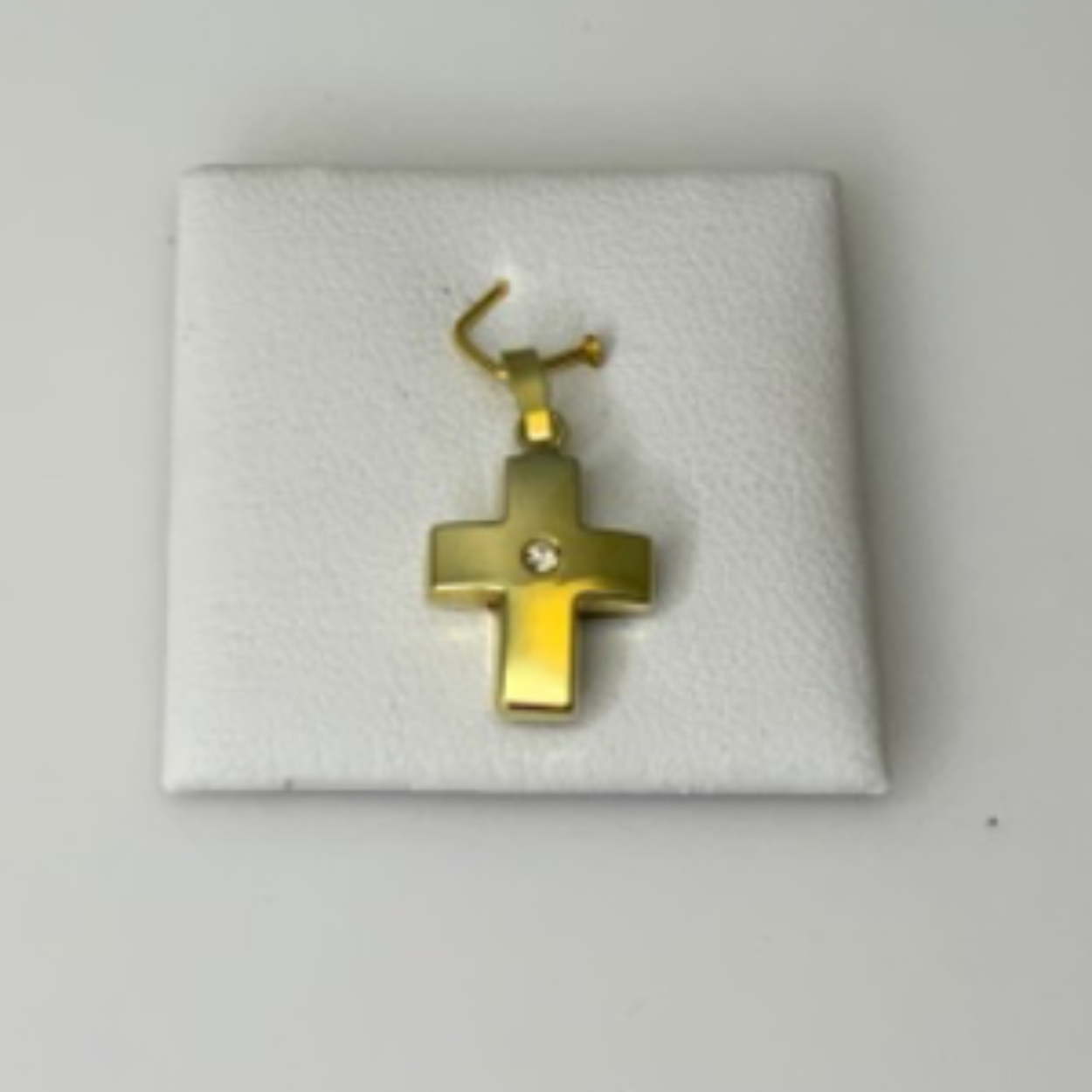 Gouden kruis met lusoog