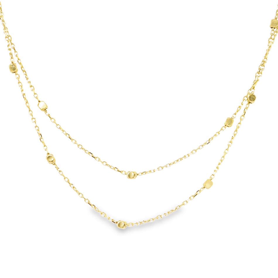 Dit 14-karaats geel gouden collier heeft een speelse uitstraling, dit komt door de dubbele ketting. De ankerschakel wordt onderbroken door gouden blokjes. Het collier is perfect voor iemand die houdt van geelgoud!

Collier GCS127WRSM is een set met armband GAS158WRSM.