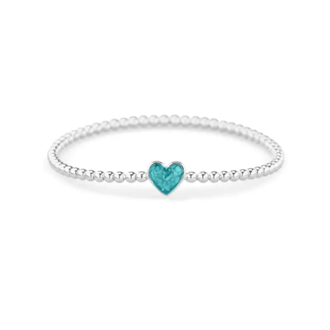 Zilveren bolletjes armband. Deze armband is voorzien van een staaldraad (geen elastiek). De armband moet net over de hand kunnen schuiven om mooi aangesloten aan de pols te kunnen dragen. Dit sieraad wordt zichtbaar aan de voorkant gevuld met as of haar en wordt vermengd met onze speciale hars.