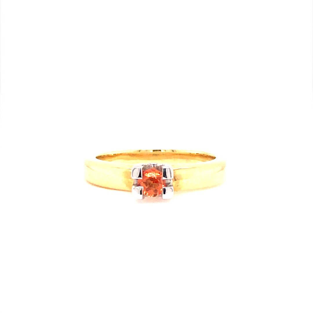  14krt geelgouden ring met oranje saffier in witgouden zetting