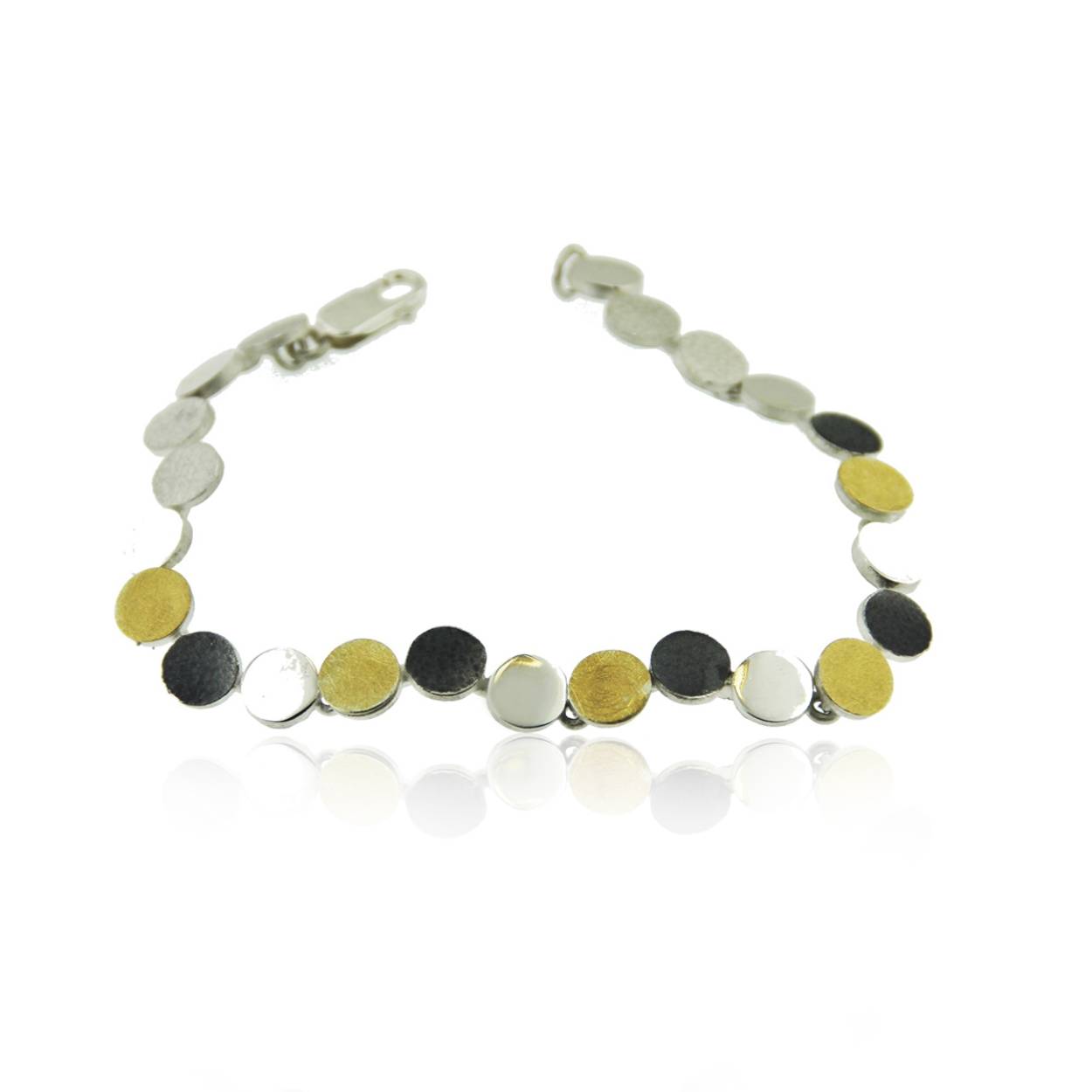 Zilveren armband met 18K gouden rondjes.