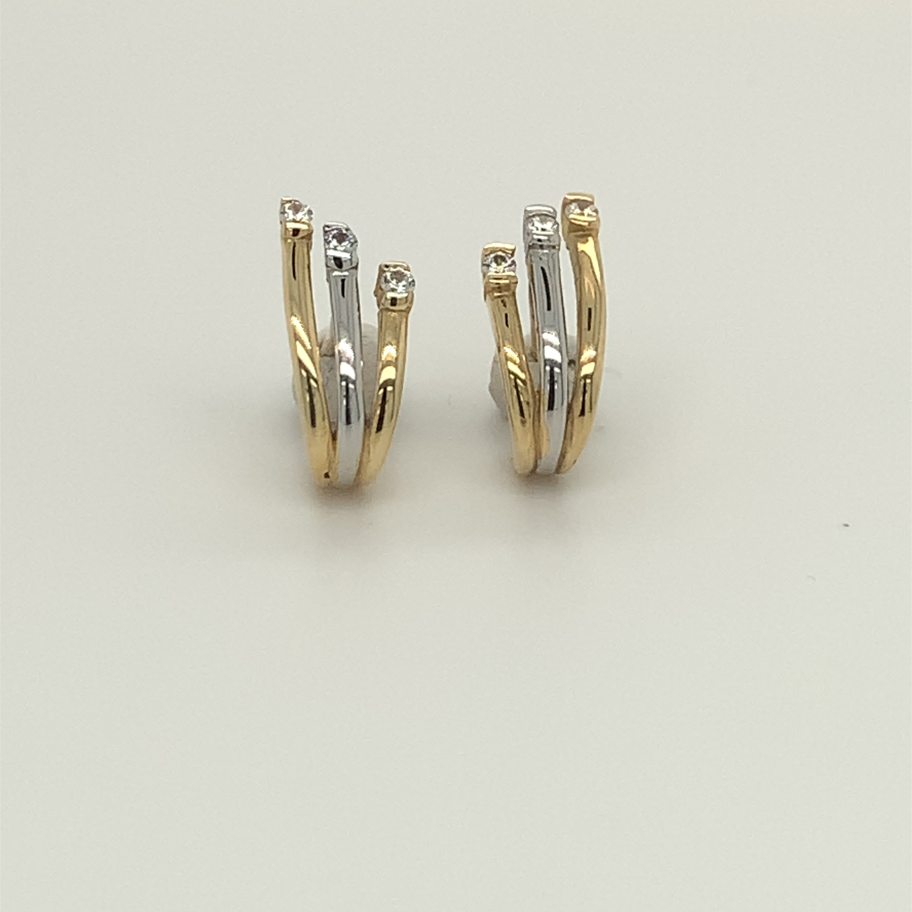 Bicolor gouden oorsieraden met zirkonia