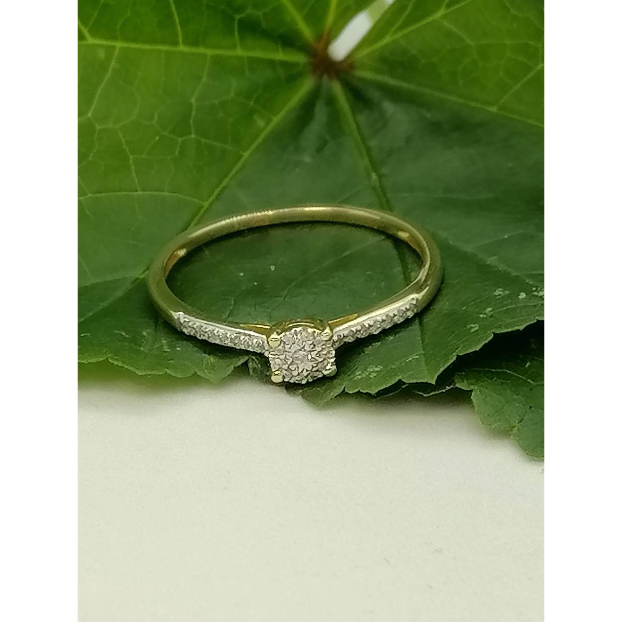 diamant gouden ring 25-0.09 crt
h si
14 kt bicolor