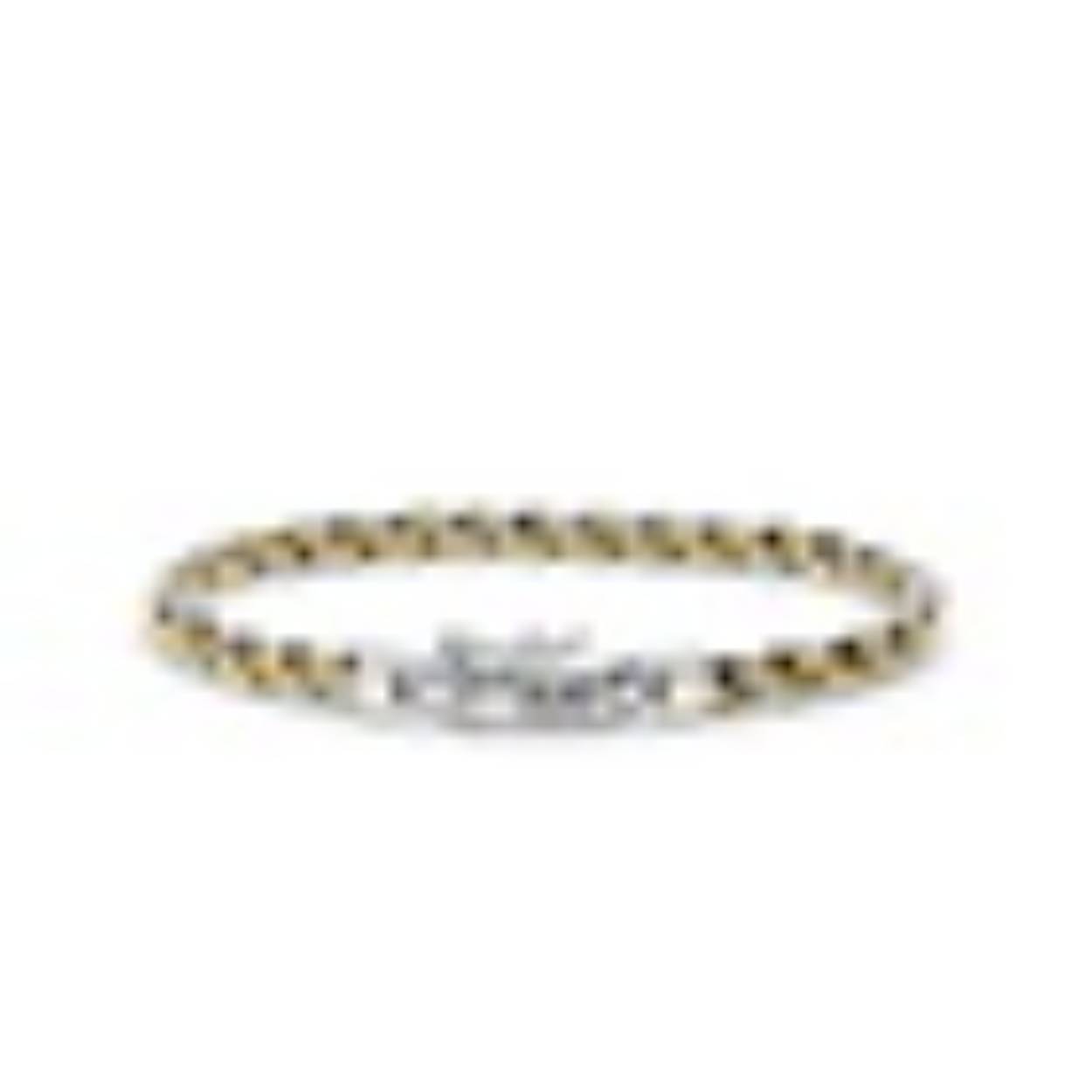 De 749 | BICOLOR armband combineert 925 sterling zilver met het niet-edele metaal messing, wat resulteert in een opvallend tweekleurig design. Breedte: 6 mm 