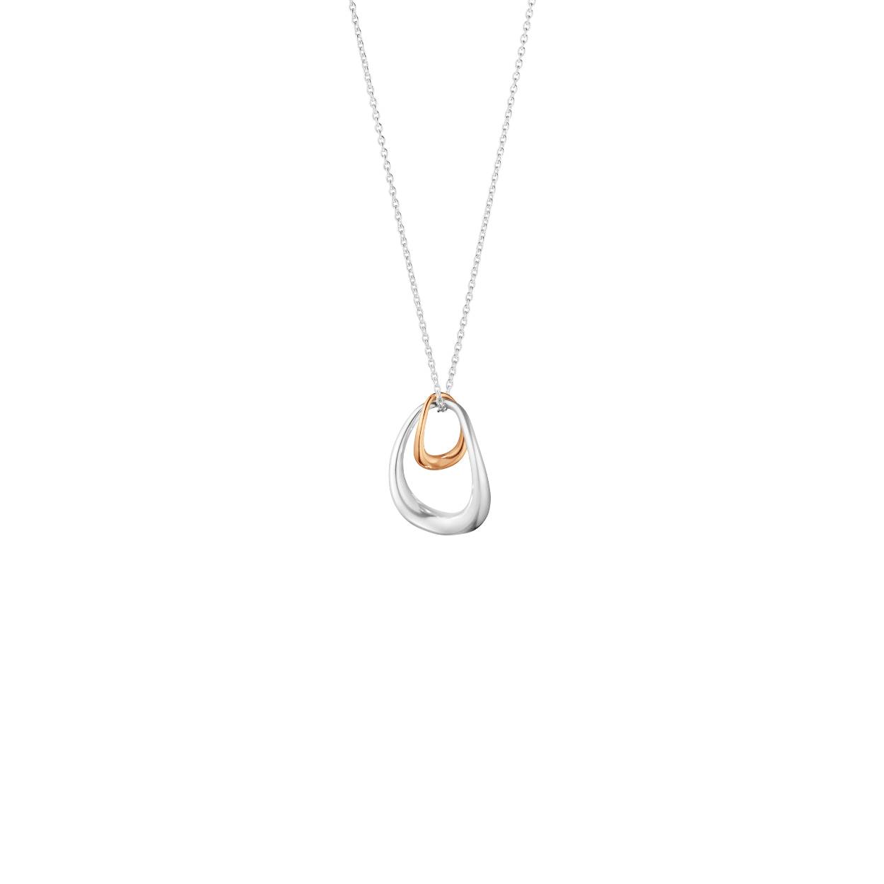 Two irregular organic shapes in silver and gold are interlocked in a form that symbolises the unbreakable bond between mother and child, lovers, friends or siblings. The Offspring necklace has a strong emotional resonance that adds an extra layer of meaning to the simple minimal beauty of its design.

Created for Georg Jensen by Jacqueline Rabun, the Offspring collection is both a masterclass in Scandinavian style but also a shining example of the way that jewellery can take its place in our hearts and lives too.

The outer ring of the pendant is made from sterling silver whilst the smaller ring from 18 karat rose gold giving the two pieces their distinct but similar personalities. The rings hang from a fine silver chain that can be adjusted in length.