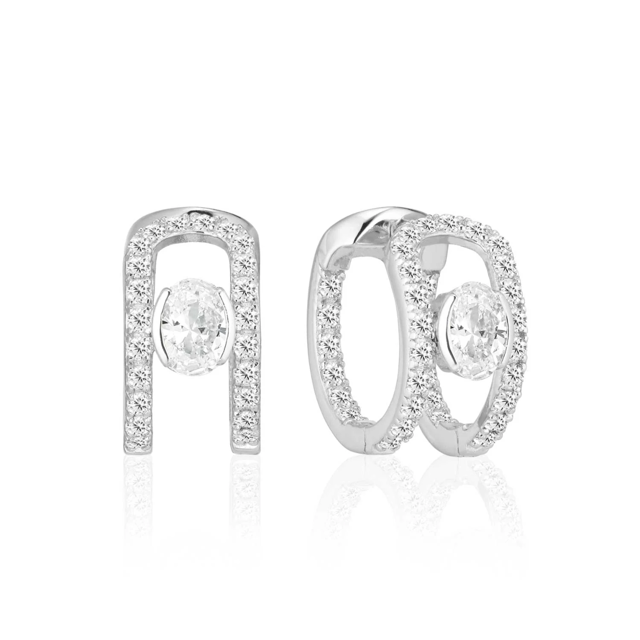 Oorbellen gemaakt van 925 sterling zilver met gerhodineerd oppervlak, gepolijst oppervlak en hoorn met facetgeslepen witte zirkonia

Afmetingen oorbellen: Diameter 16 mm, breedte 8,4 mm