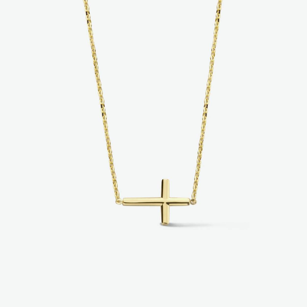 14k Geelgouden collier uitgevoerd met een hanger in de vorm van een kruis. Het collier heeft een draaglengte van 42cm met een extensie van 3cm.