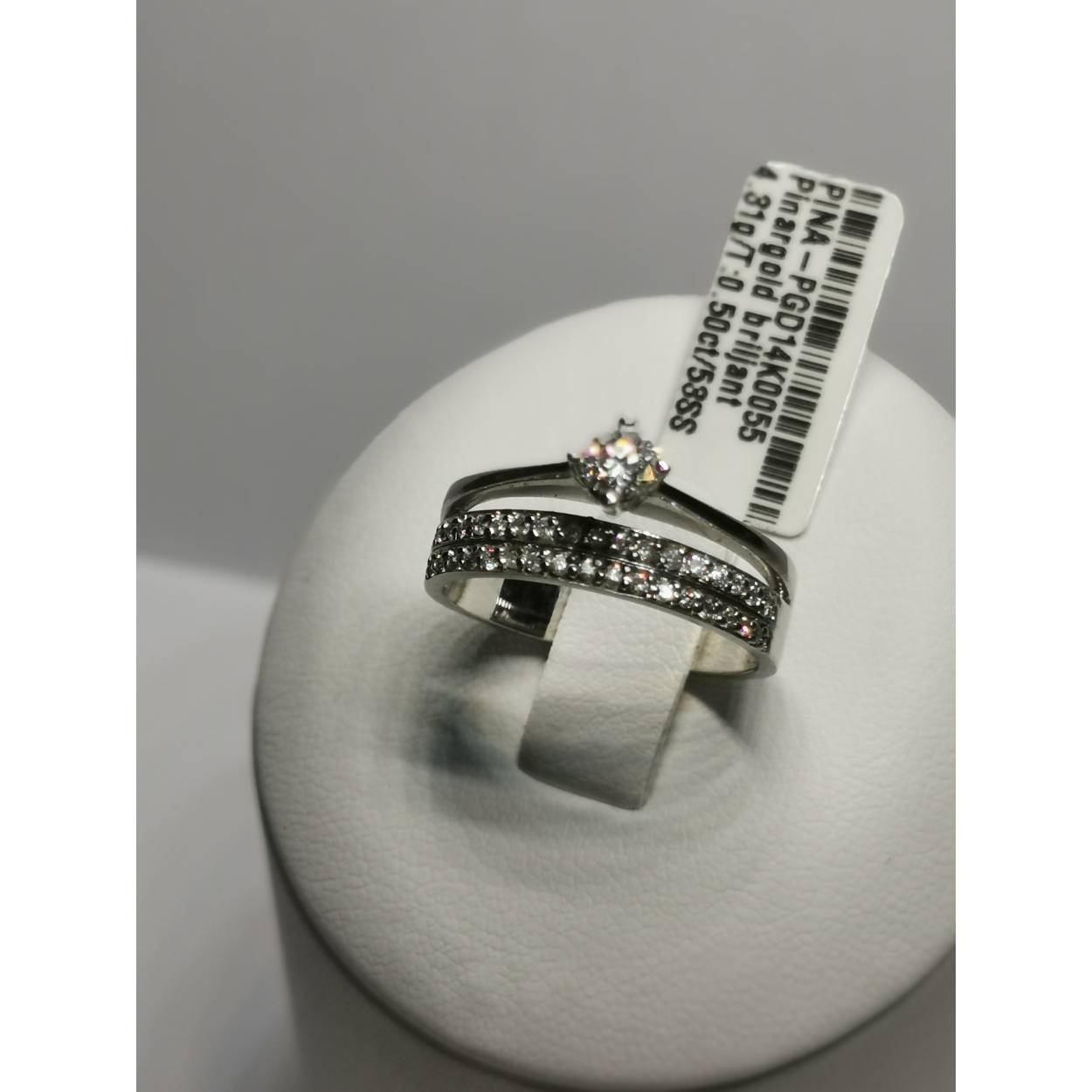 14 karaat wit gouden combinatie ring. Solitaire met Alliance met briljanten.