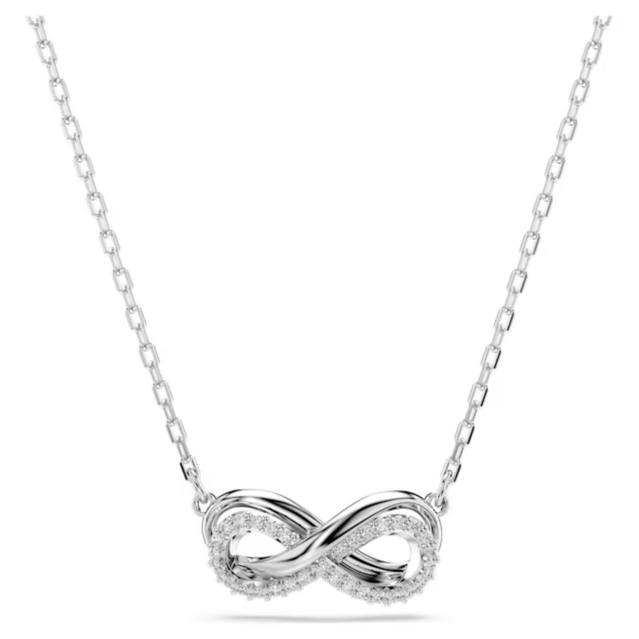 Deze oogverblindende Hyperbola-hanger valt op dankzij het oneindigheidssymbool, dat staat voor eeuwige schoonheid. Het sieraad met rhodium toplaag wordt gedragen aan een delicate ketting. Het elegante motief is verfraaid met een pavé van heldere kristallen. In het verlengstuk prijkt een Swarovski Zirkonia voor een extra luxe uitstraling. Een perfect cadeau voor een geliefde of een manier om uw eigen alledaagse stijl te verfraaien.
