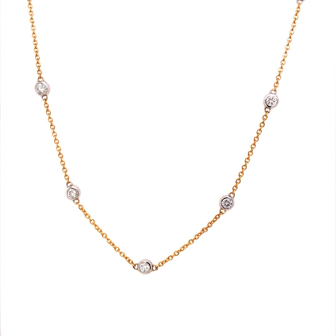 Eclat 14krt geelgouden collier met diamant in witgouden zetting